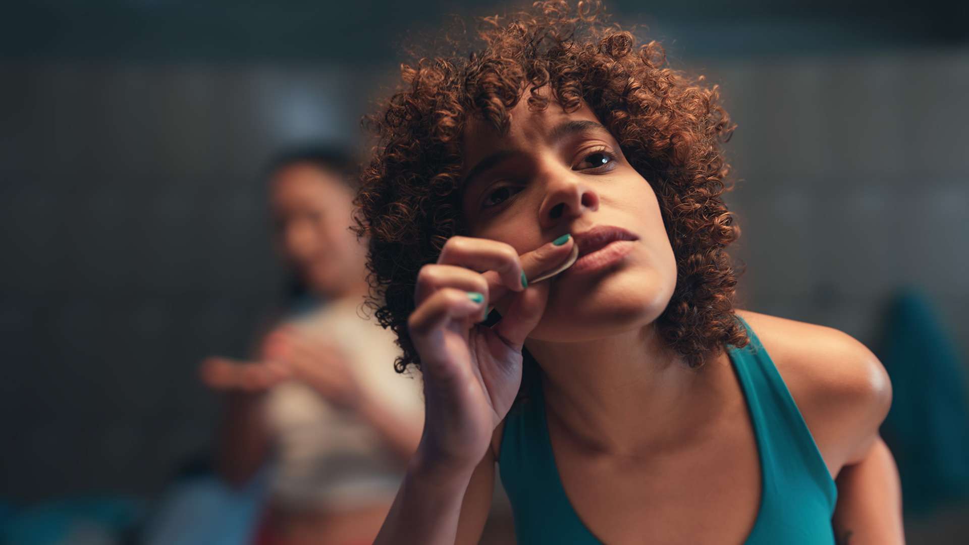 Woman touching her lip